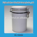 Blue ceramic tea canister with plastic cover